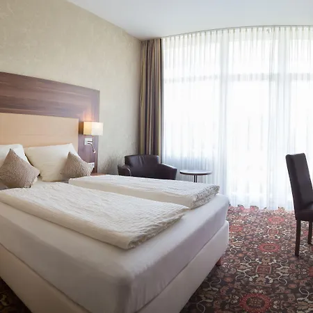 Отель Vitalhotel Koenig Am Park Бад-Мергентхайм
